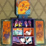 mixed media assemblage: old wood cabinet, wooden utensils, painted sticks, collage, acrylic paint, watercolor